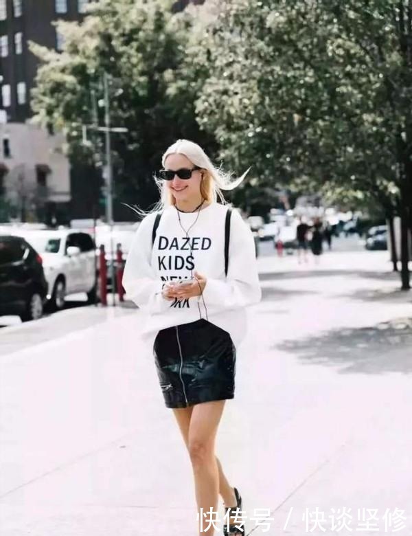 这才是早春流行的穿搭:“卫衣+半身裙” , 显高显瘦又不拖沓