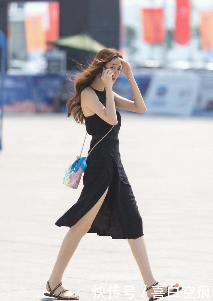 街拍紧身裙诠释了时尚的气息,把街道变成女孩秀身材的主场