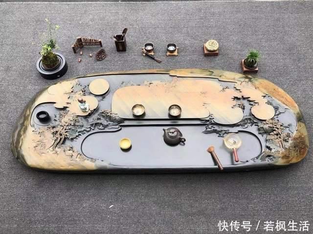 石头@真正的“难得一见”，把长近2米的石头刻成山水画，还制成了茶盘