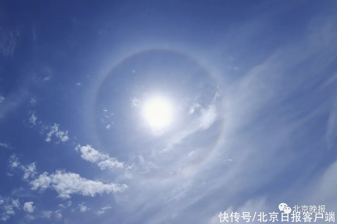 今日，北京上空现日晕奇观！“日晕三更雨”真要来了