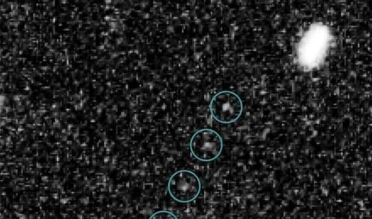 美国宇航局新视野号探测器飞掠冥王星，新视野背后的团队表示好奇