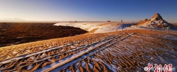老年|柴达木盆地冰雪点缀沙雕景观 展现“金色世界”别样魅力