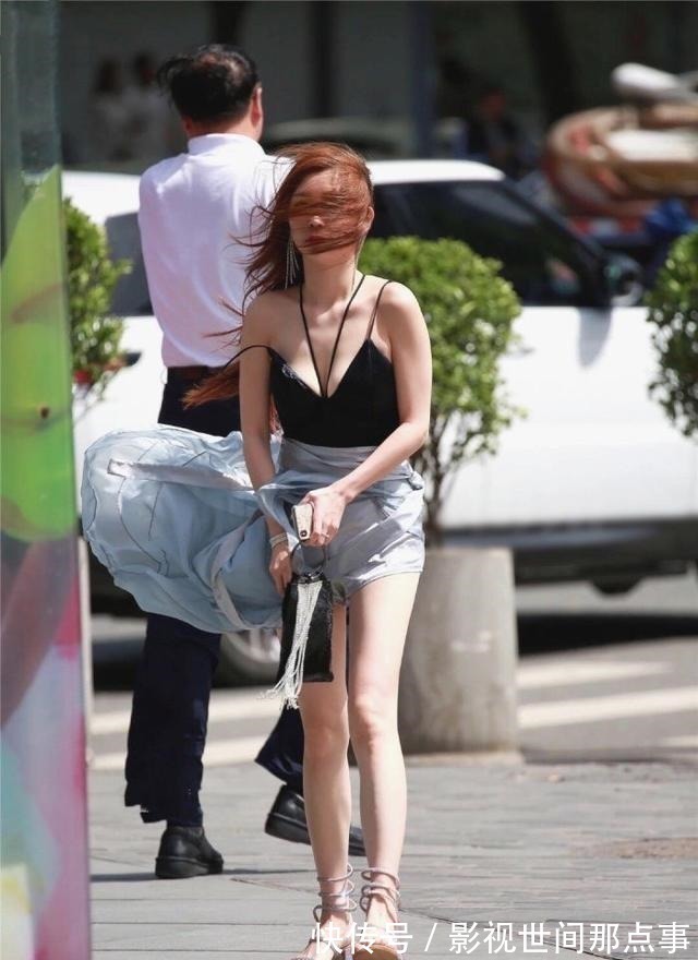 清凉 姐姐的穿搭不合时宜,薄纱长裙风中凌乱,狼狈不堪!