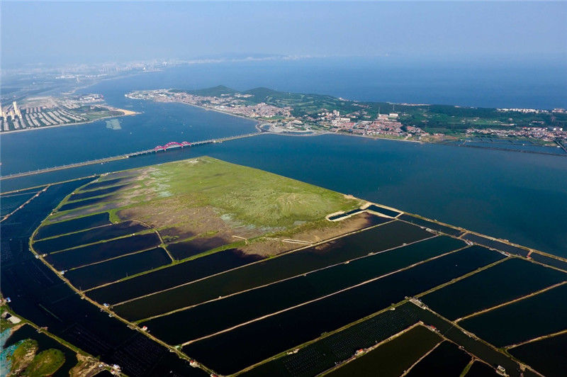 山光海色秀如画，群礁嶙峋水拍岸，海上幻境养马岛