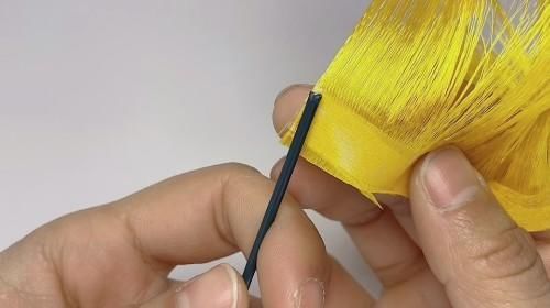 金黄色|紫色丝带芦苇花火了，试着给金黄色的丝带抽个丝，成品也很赞