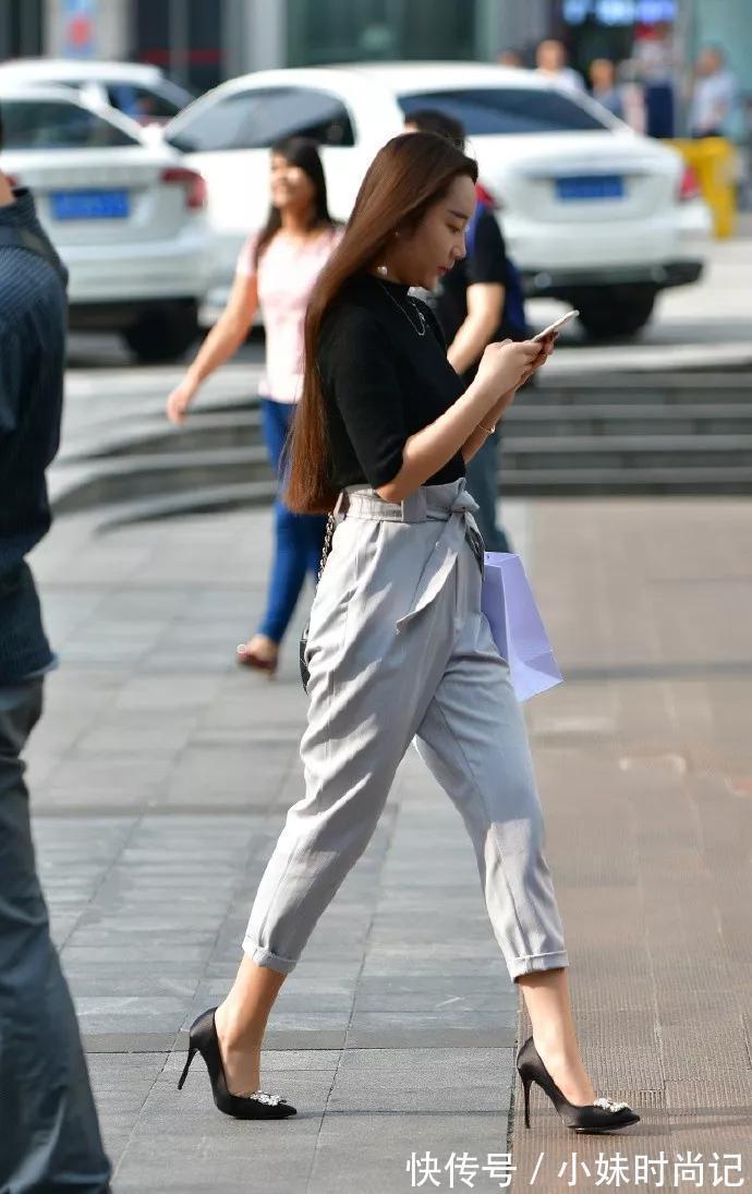 小姐姐|美女脚上穿着一双粉色亮片尖头的高跟鞋,气质又时尚,优雅又魅力