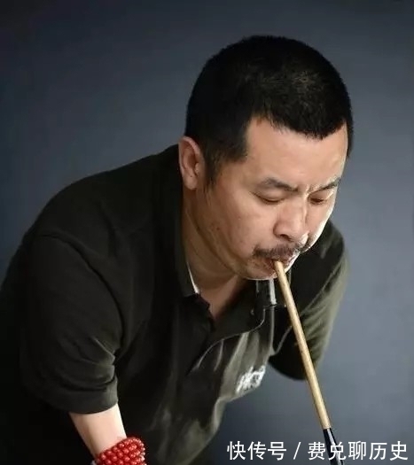 妙法莲华经&无手书法家:以口衔笔抄写500米长卷小楷,后又抄写百万字经书