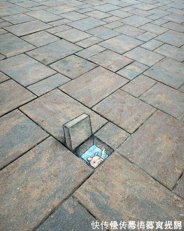 密歇根州!他用粉笔在街边“乱涂乱画”,吸引了百万粉丝,网友:能多来点吗