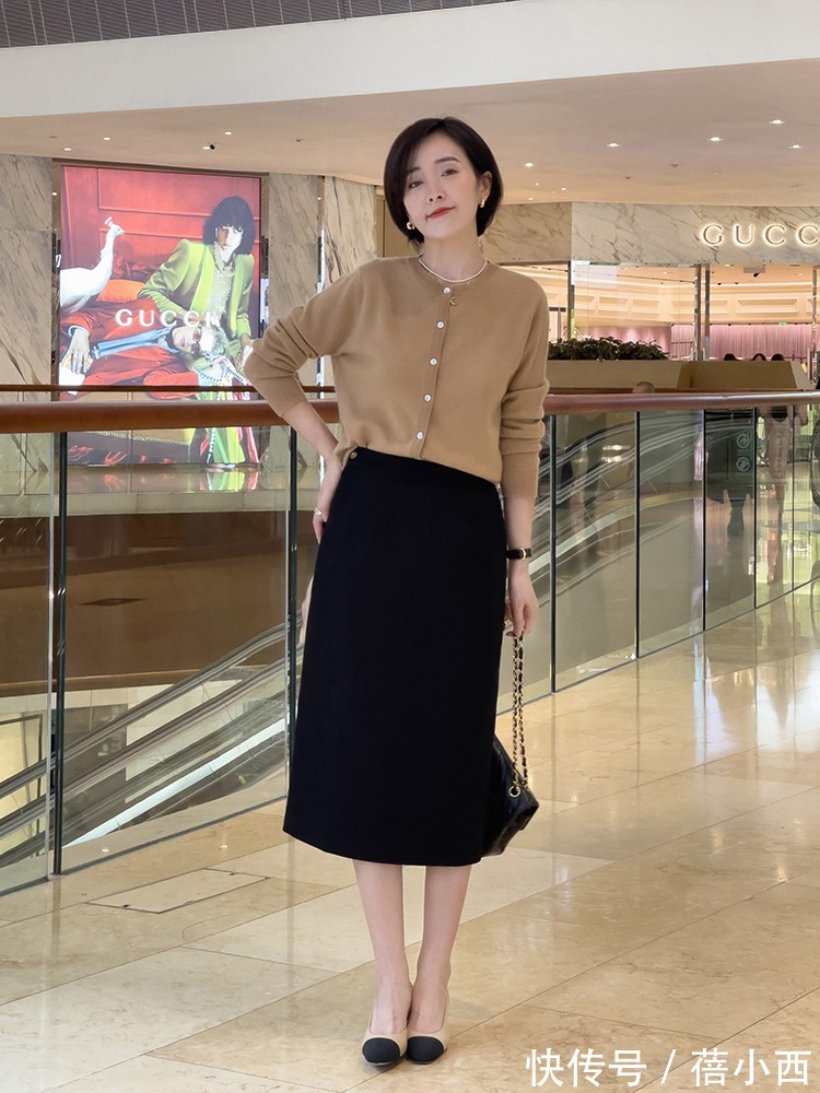 搭配 早春穿裙子流行“过膝不过踝”,配西装、风衣都挺美,打造时髦感
