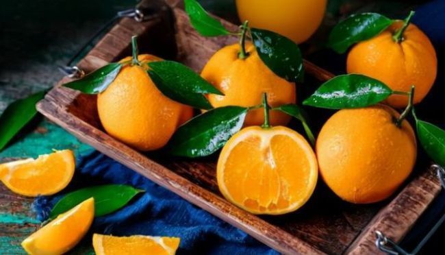 回家过年|新的一年新的目标,3种吉吉果放在客厅里,寓意大吉大利喜气盈盈