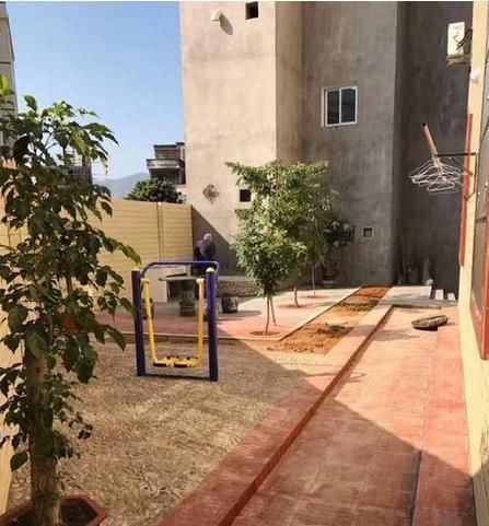 楼梯|农村老家别墅装修完工，庭院养鱼又栽花，旋转楼梯更赞！晒晒