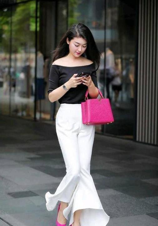 身材高挑|扎着高马尾的小姐姐,身穿套装,显示出一种十分帅酷的感觉