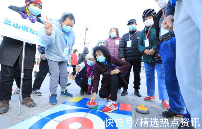 冬奥会|百人齐聚陆地冰壶友谊赛 八宝山街道居民体验家门口的“冬奥会”