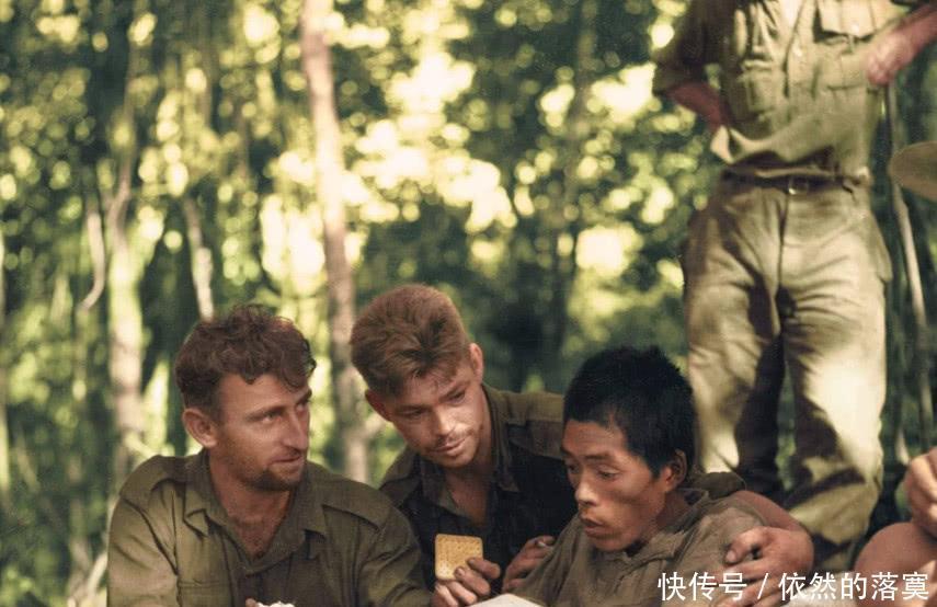 德军|二战彩色老照片神情呆滞的日本战俘、坐在德军坦克上的法国女人!