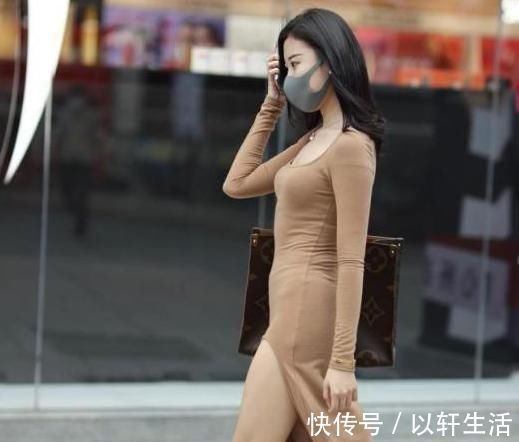 长裙 浅咖色纯棉长裙搭配复古包包,优雅大方,笑容迷人