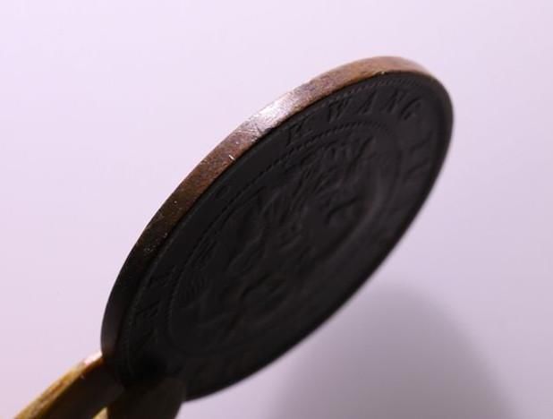 制钱十文|家有“光绪元宝”的注意了,一枚“十文低宝七刺”的价值,是你无法想象的