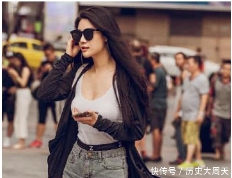 街拍:打扮时尚展现优美的曲线,是个精致的女人