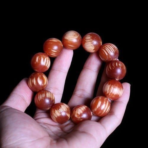 木质文玩|这种木头看上去像蜜蜡,号称“北沉香”,东北人一定见过它