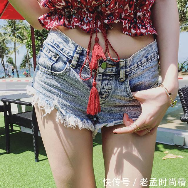 阔腿 时尚的毛边设计,简约的牛仔短裤,彰显女生的性感,凸显大长腿