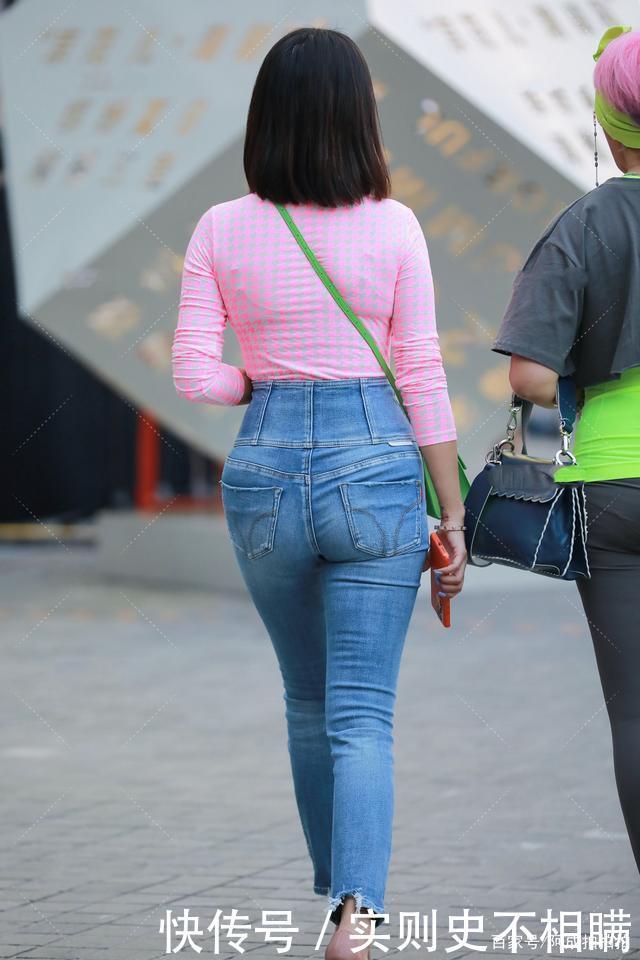 身穿粉色长T恤，艳丽上衣，搭配魔力短发冷艳高级