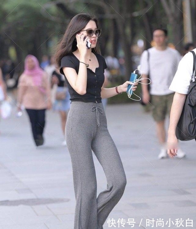 搭配 黑色低领上衣搭配高腰休闲裤,简约时尚,青春靓丽