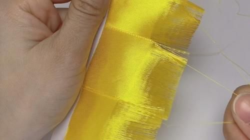 金黄色|紫色丝带芦苇花火了，试着给金黄色的丝带抽个丝，成品也很赞