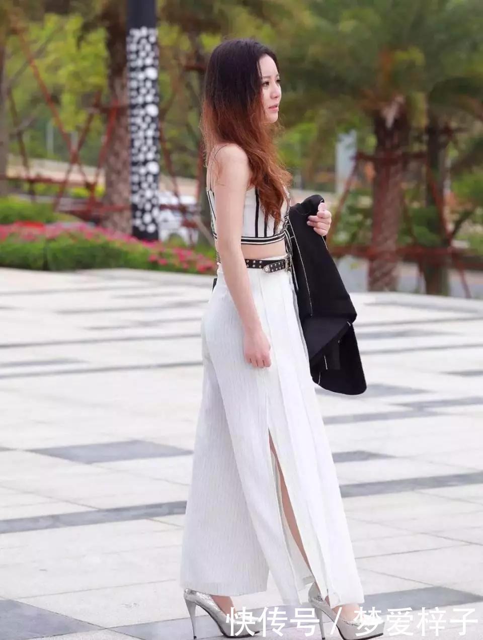 小姐姐脚上搭配一双尖头高跟鞋,一种都市时尚女性的气息扑面而来