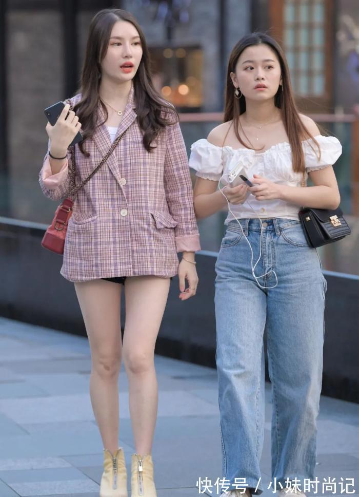 美女 街拍美女:皮肤白皙美丽的颜值美女,粉色西装外套和潮流短裤,清纯美丽