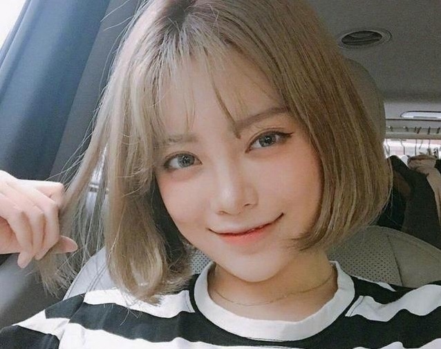 圆脸型的女生适合留什么刘海显得时尚一些?