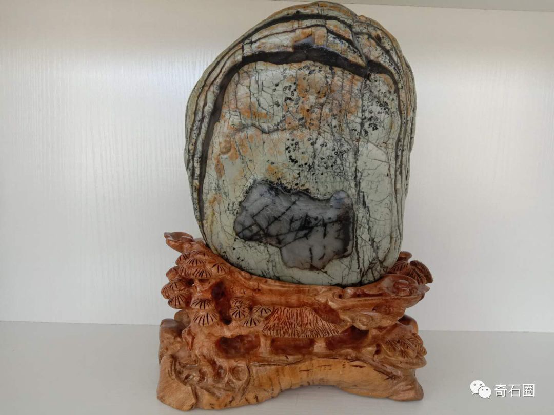 石头|金沙江边的康巴汉子捡了8年石头,摆满了一屋